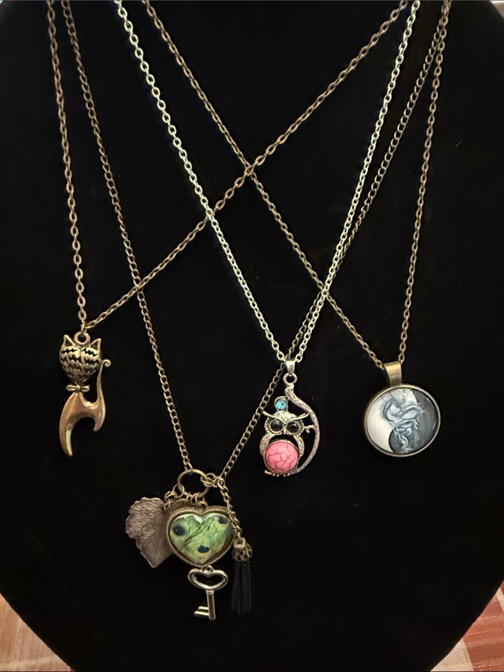 4 piece necklace lot- cat- owl- dragon- leaf/peacock